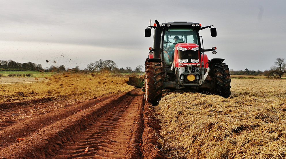 Huntapac Tractor ploughing field