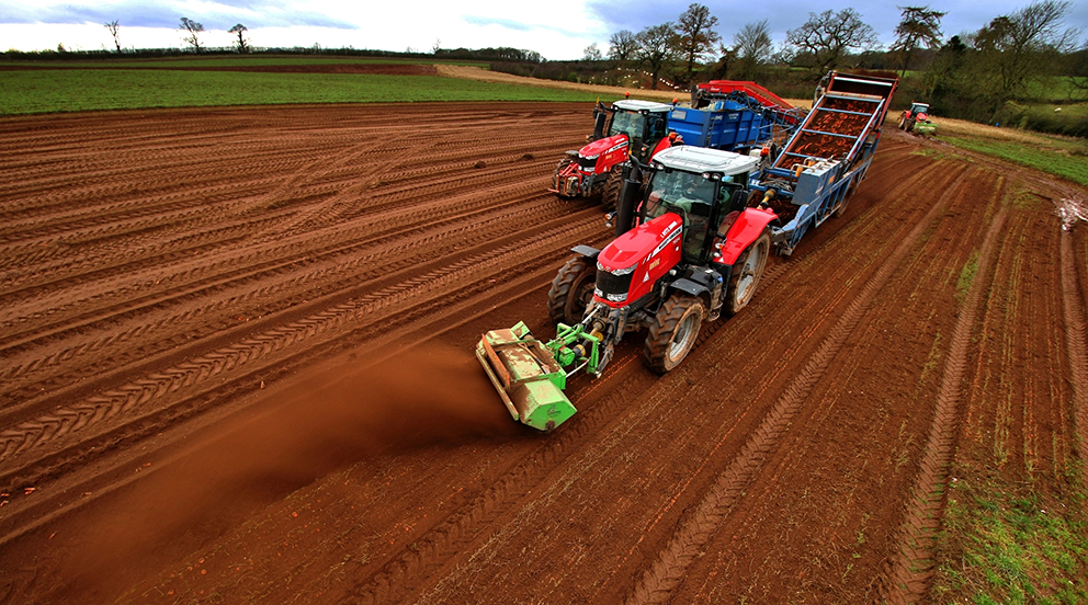 Two Huntpac tractors in a field